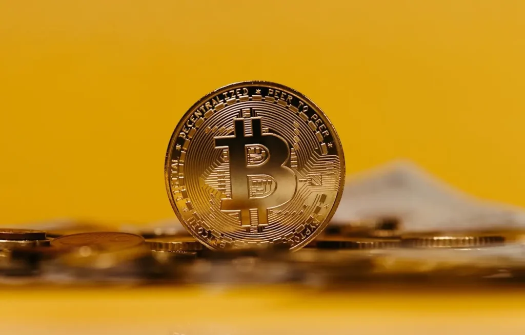 Pièce avec le logo bitcoin
